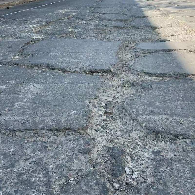 鹿城路面起砂露石子修补料